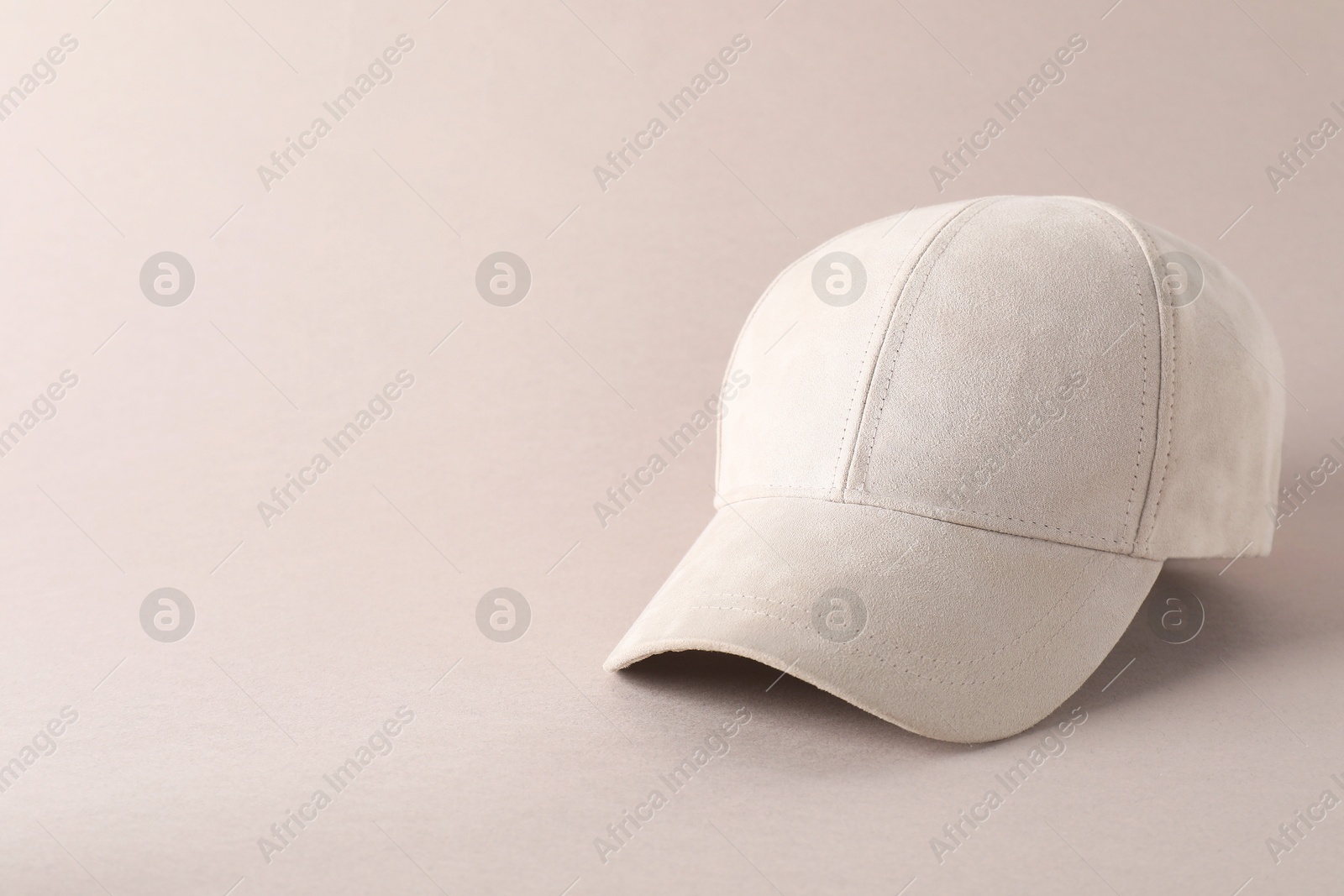 Photo of Stylish baseball cap on light grey background. Mockup for design