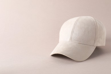 Photo of Stylish baseball cap on light grey background. Mockup for design