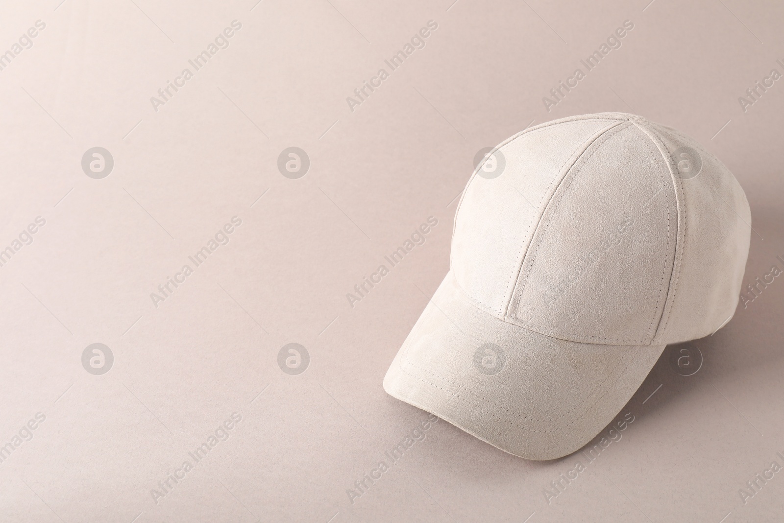 Photo of Stylish baseball cap on light grey background. Mockup for design