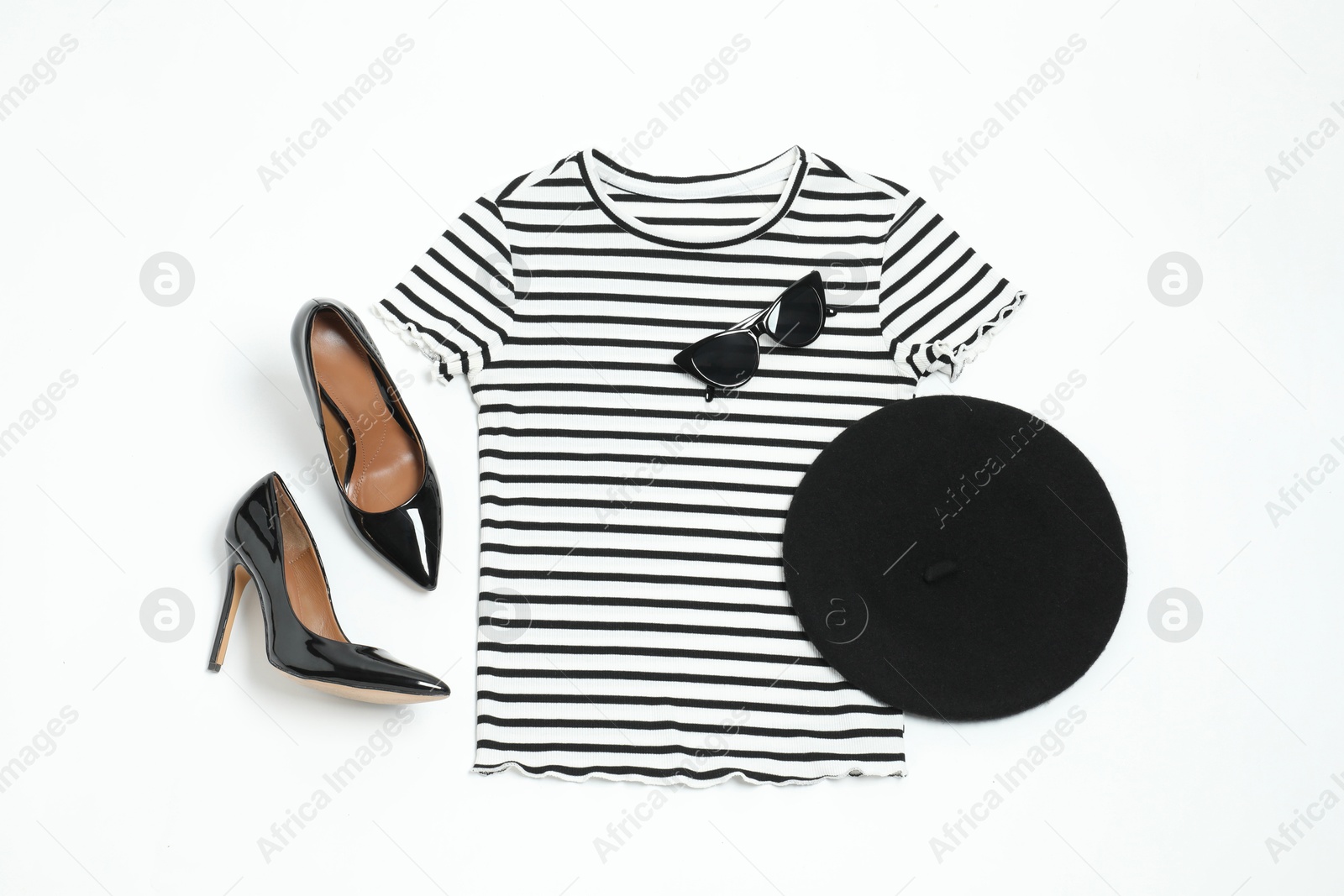 Photo of Retro styled outfit on white background, flat lay