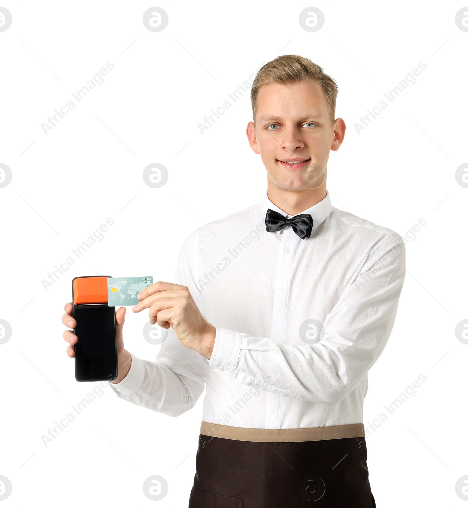 Photo of Happy waiter with payment terminal and debit card on white background