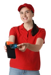 Happy courier with payment terminal and debit card on white background