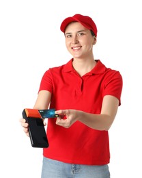 Photo of Happy courier with payment terminal and debit card on white background