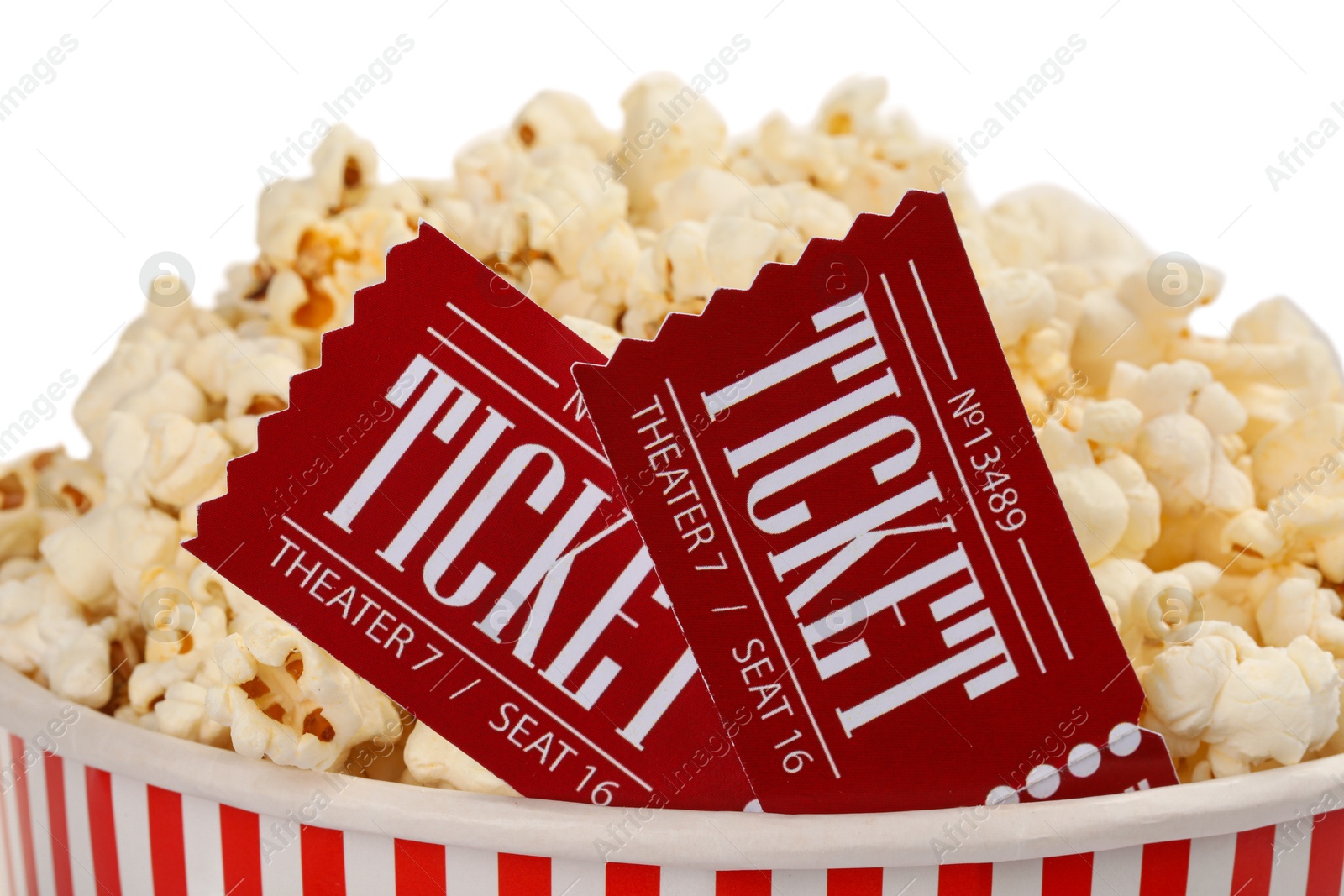 Photo of Tasty popcorn and movie tickets isolated on white