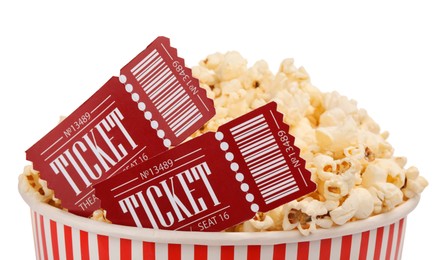 Photo of Tasty popcorn and movie tickets isolated on white