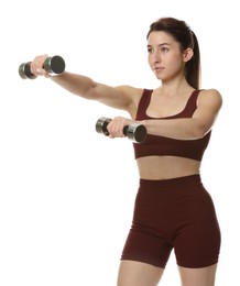 Photo of Woman in sportswear exercising with dumbbells on white background