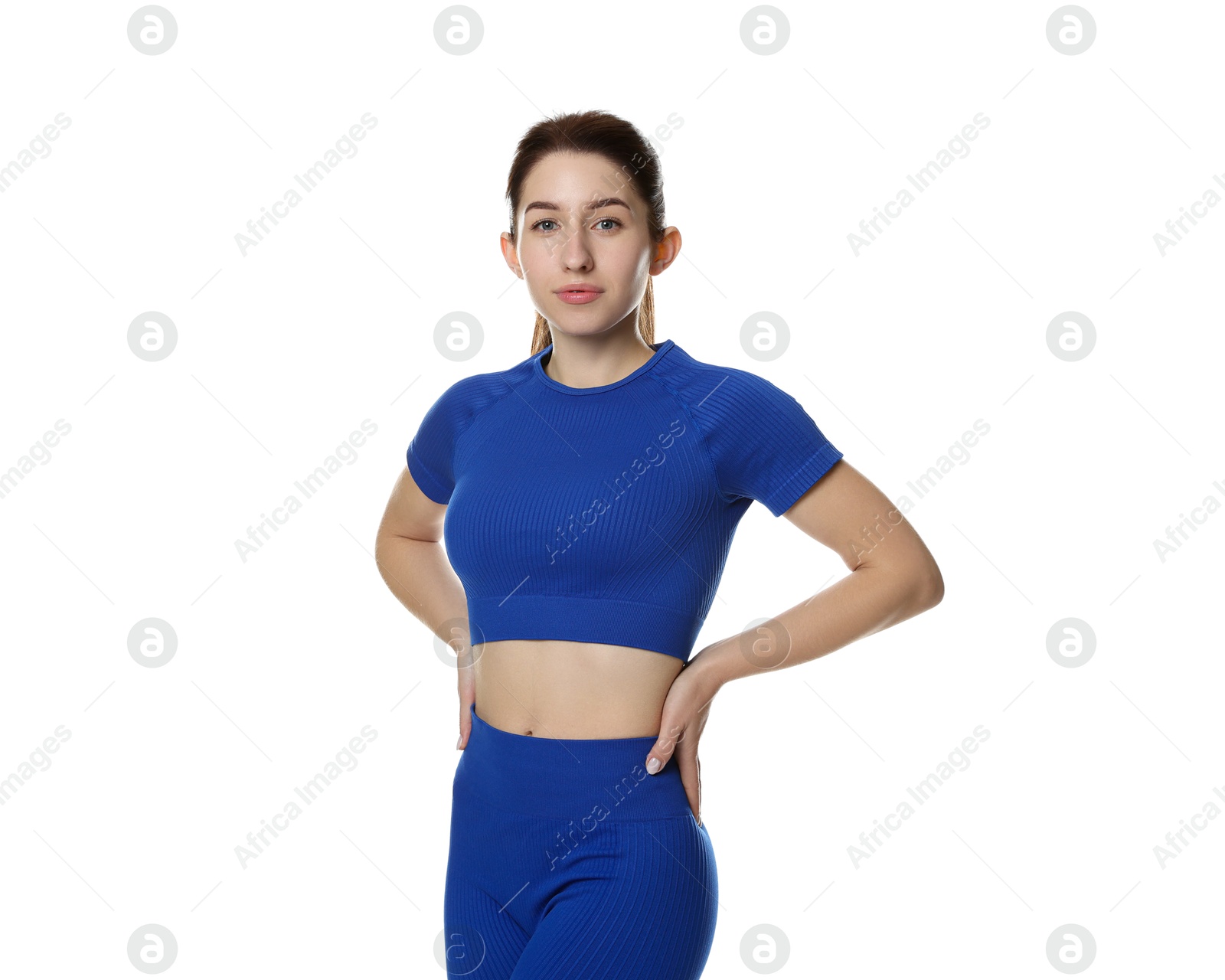 Photo of Portrait of woman in sportswear on white background