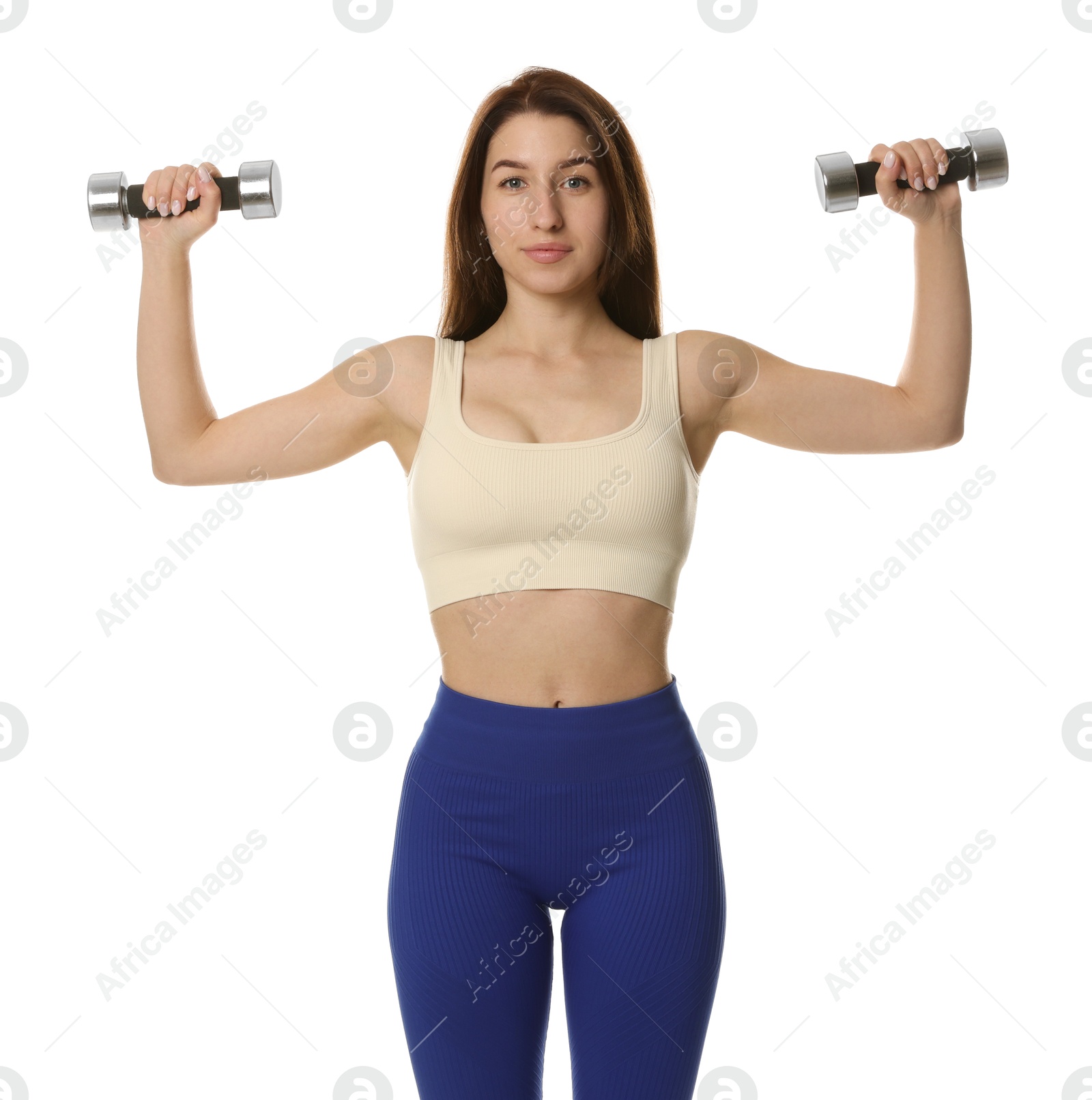 Photo of Woman in sportswear exercising with dumbbells on white background