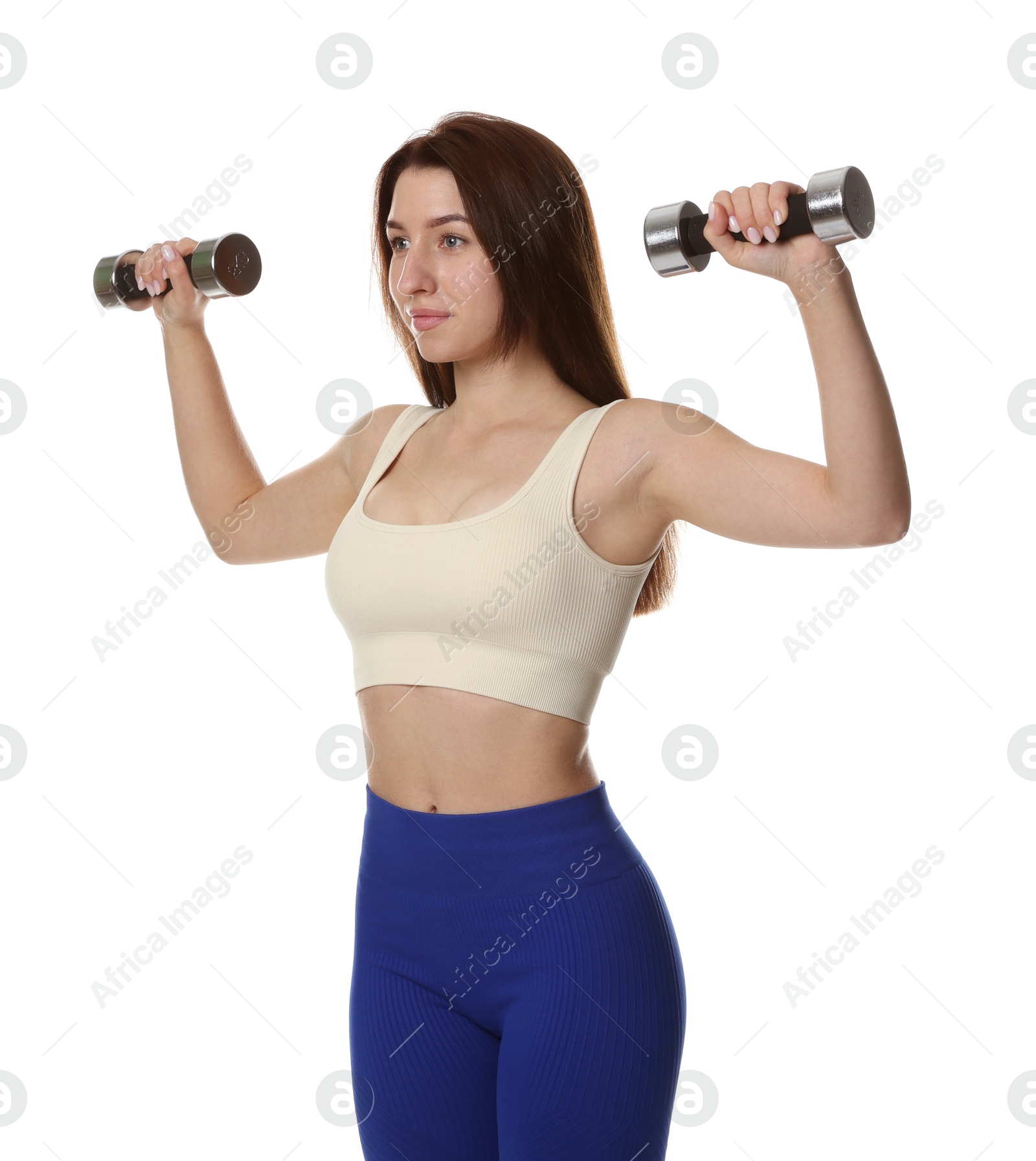 Photo of Woman in sportswear exercising with dumbbells on white background