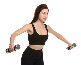 Photo of Woman in sportswear exercising with dumbbells on white background