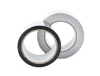 Photo of Rolls of silver adhesive tape isolated on white