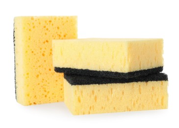 Photo of Yellow sponges isolated on white. Cleaning supply