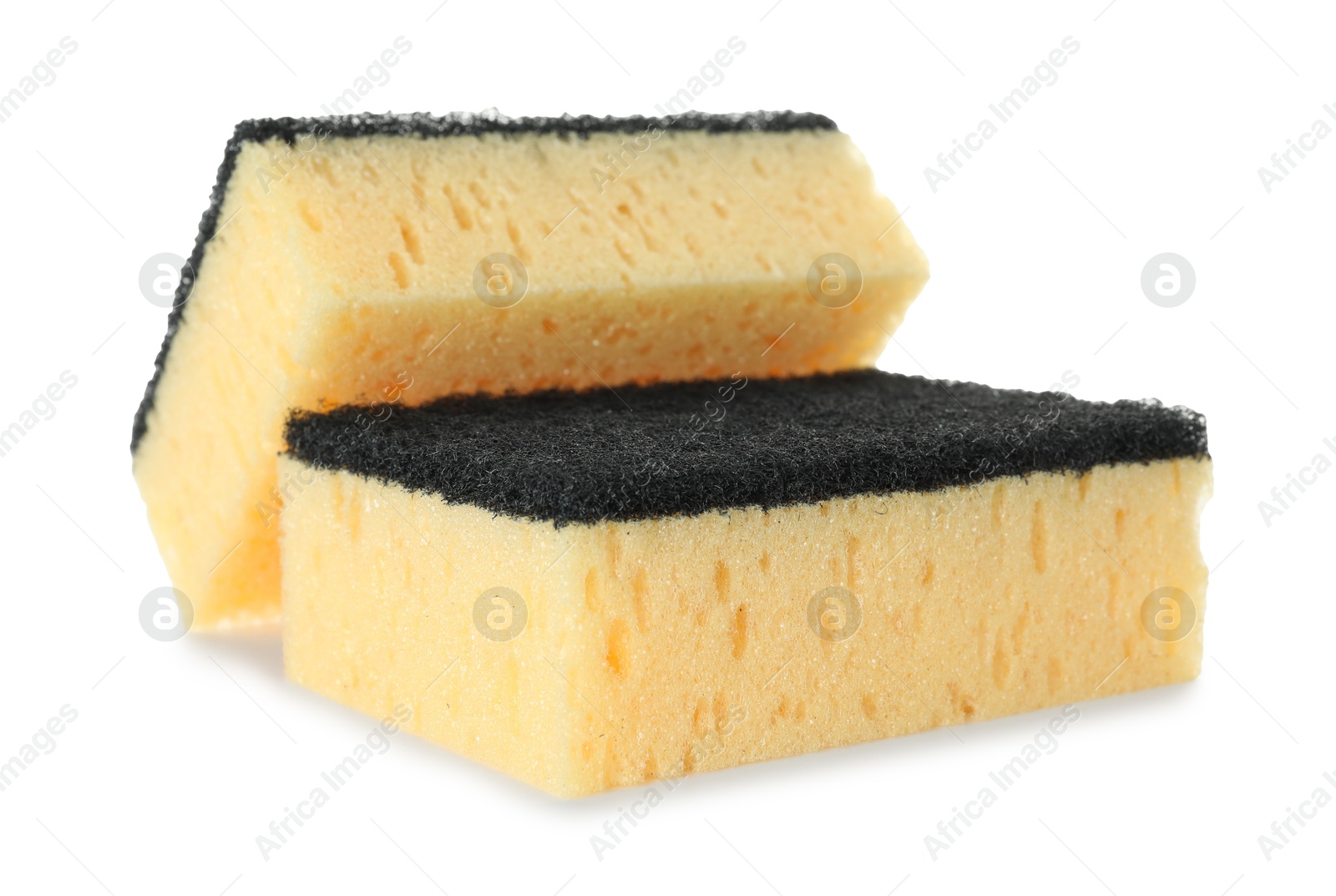 Photo of Two yellow sponges isolated on white. Cleaning supply