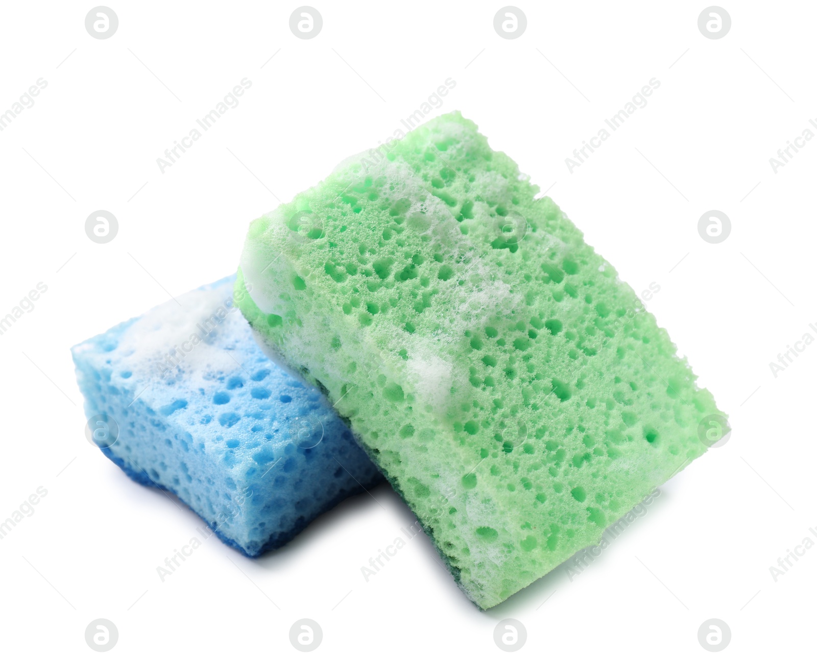 Photo of Two sponges and foam isolated on white. Cleaning tool