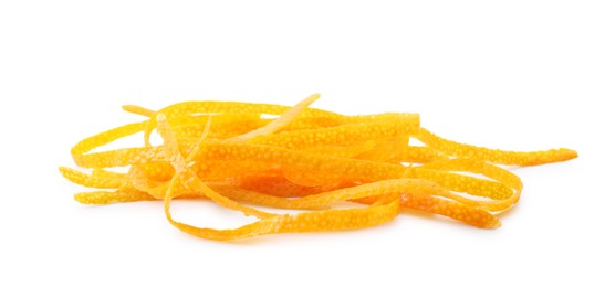 Photo of Pieces of orange zest isolated on white