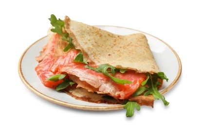 Photo of Delicious crepes with salmon and arugula isolated on white