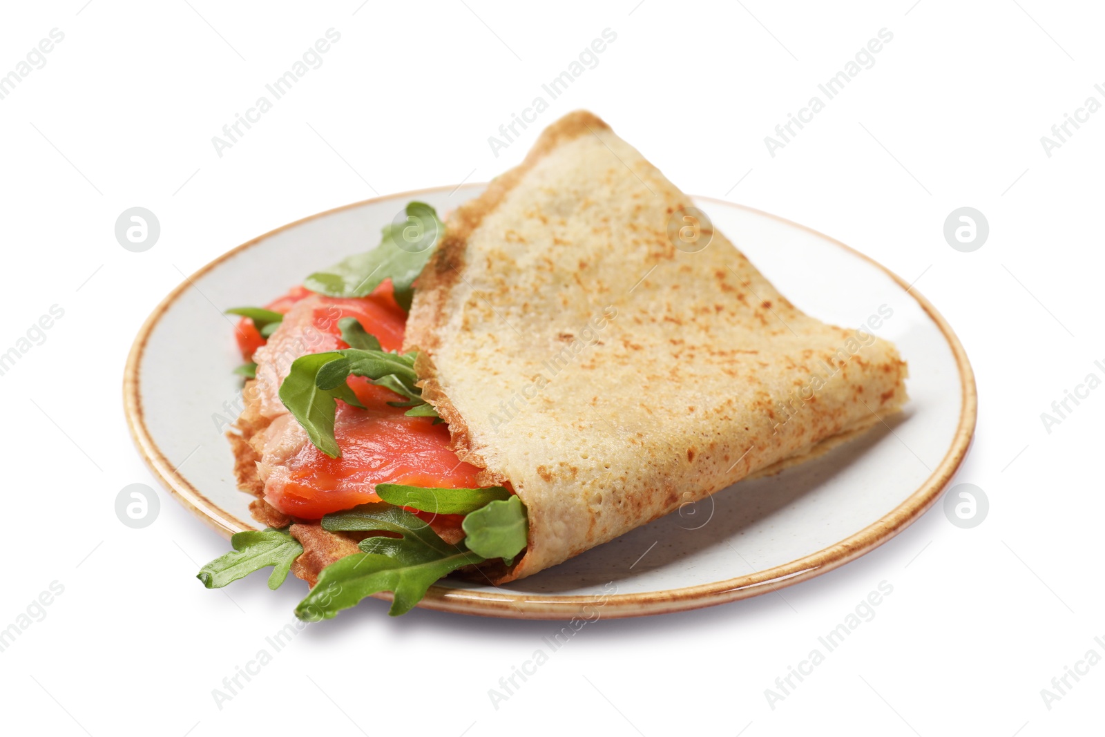 Photo of Delicious crepes with salmon and arugula isolated on white