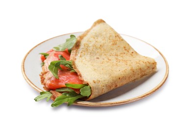 Photo of Delicious crepes with salmon and arugula isolated on white