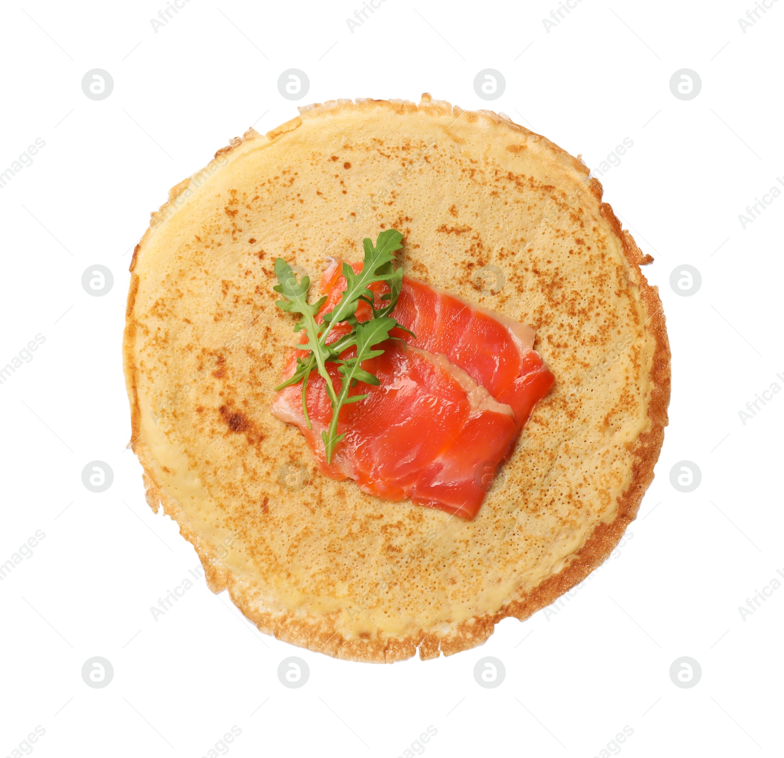 Photo of Delicious crepe with salmon and arugula isolated on white, top view