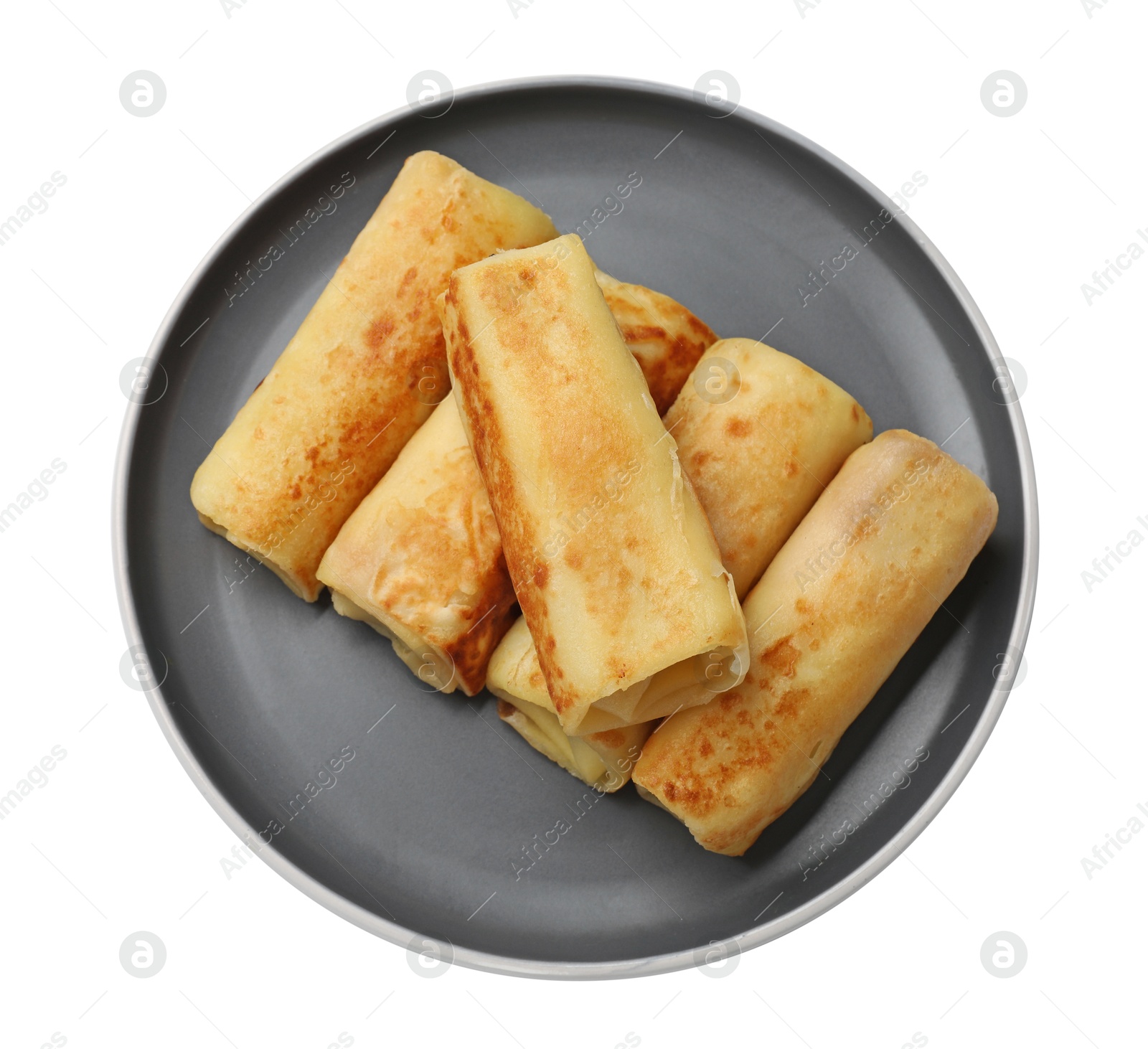 Photo of Many delicious rolled crepes isolated on white, top view