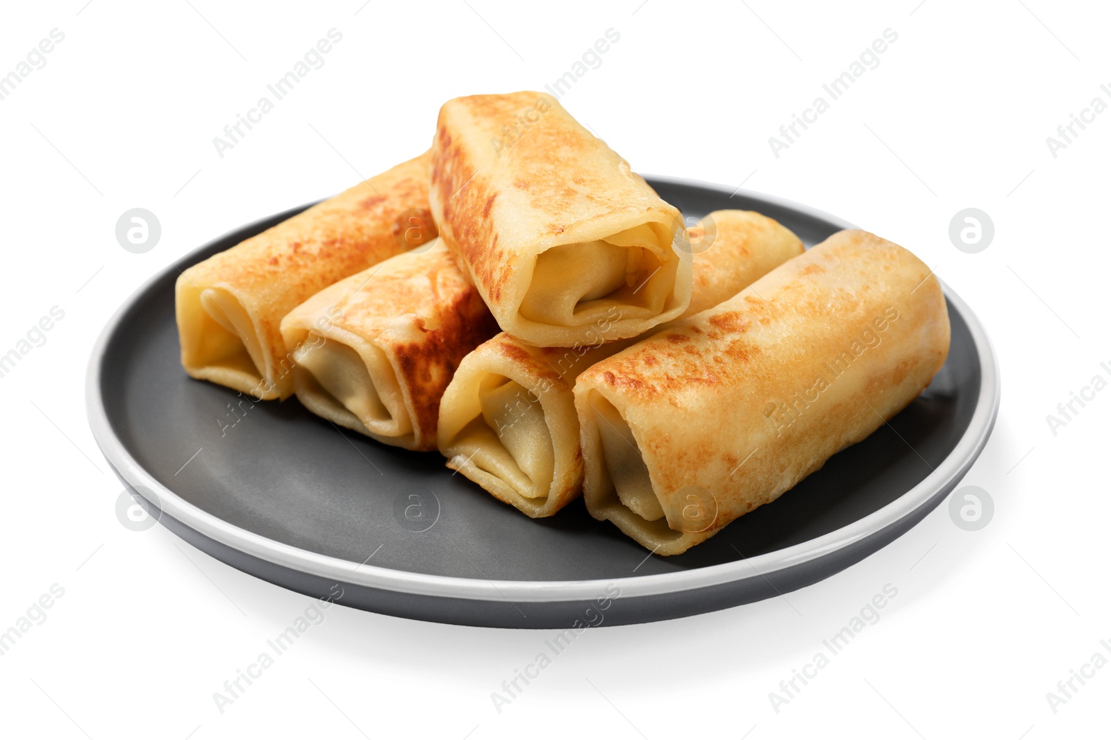 Photo of Many delicious rolled crepes isolated on white