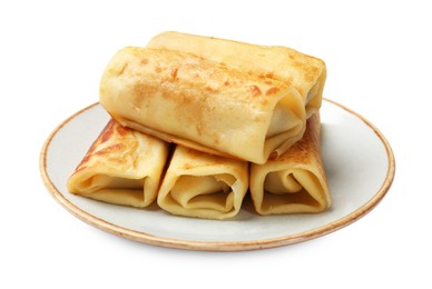 Photo of Many delicious rolled crepes isolated on white