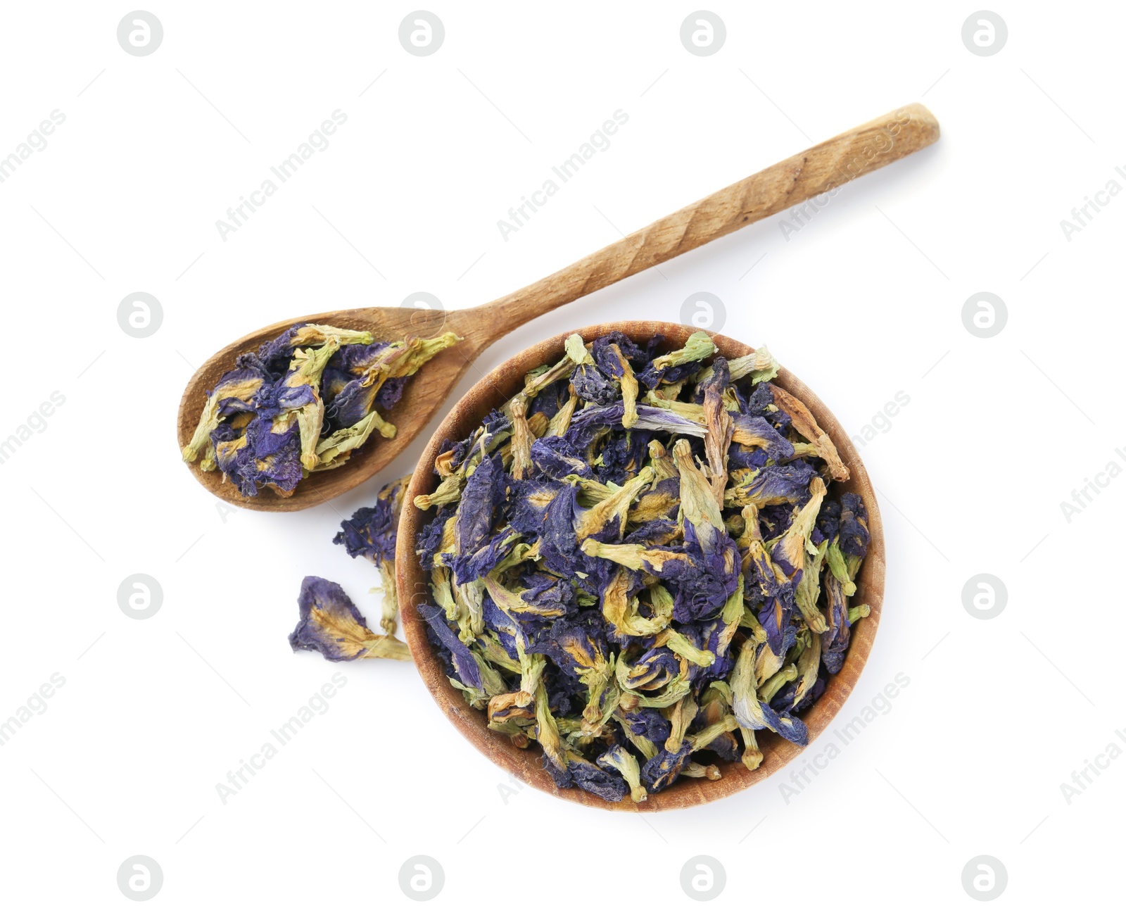Butterfly pea flower tea in bowl and spoon isolated on white, top view Photo of Butterfly pea flower tea in bowl and spoon isolated on white, top view