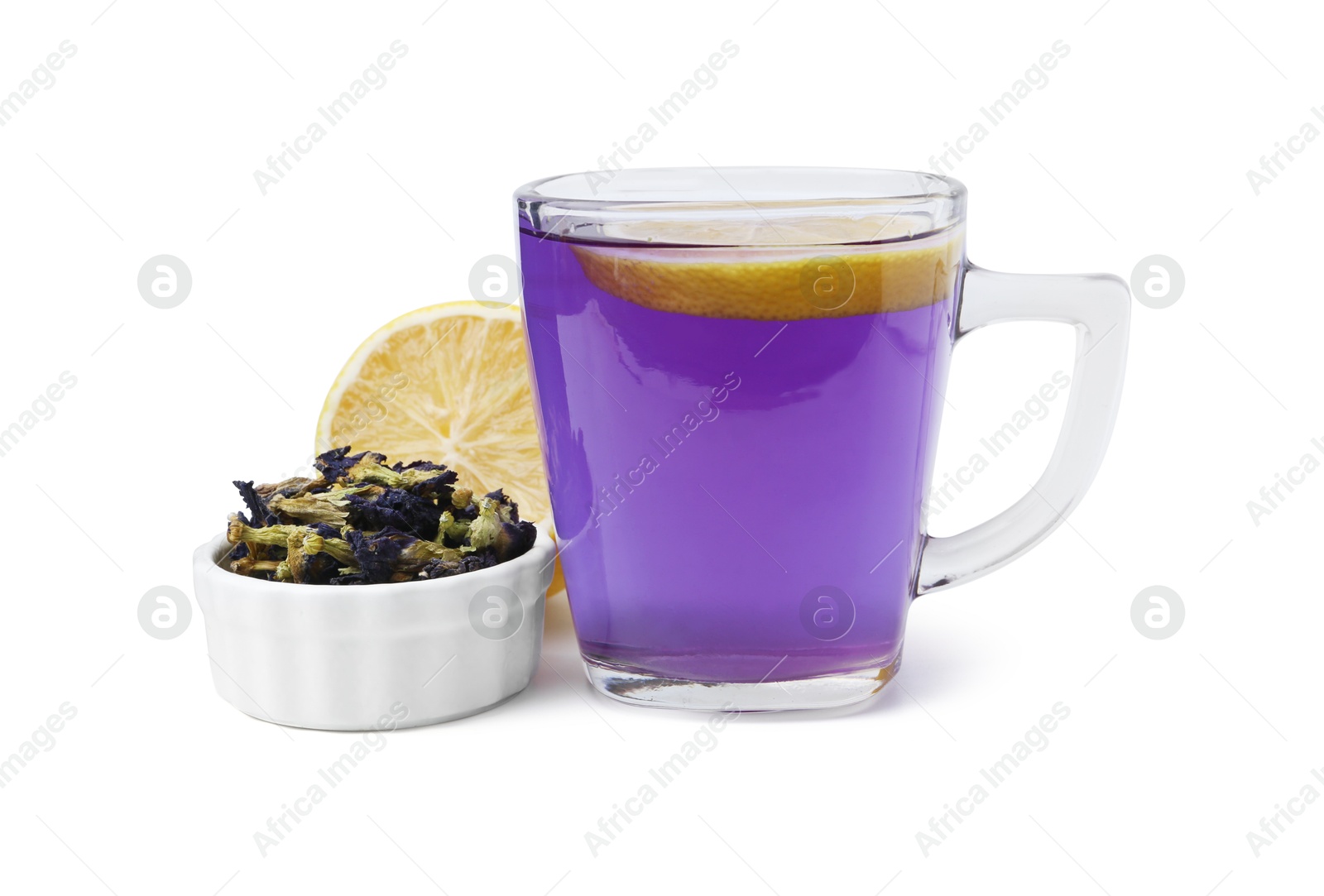 Delicious butterfly pea flower tea with lemon isolated on white Photo of Delicious butterfly pea flower tea with lemon isolated on white