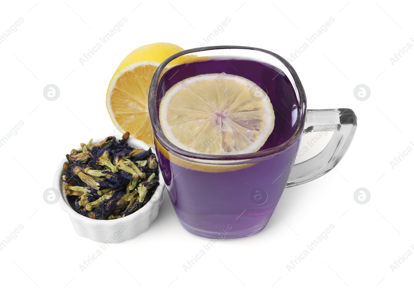 Delicious butterfly pea flower tea with lemon isolated on white Photo of Delicious butterfly pea flower tea with lemon isolated on white