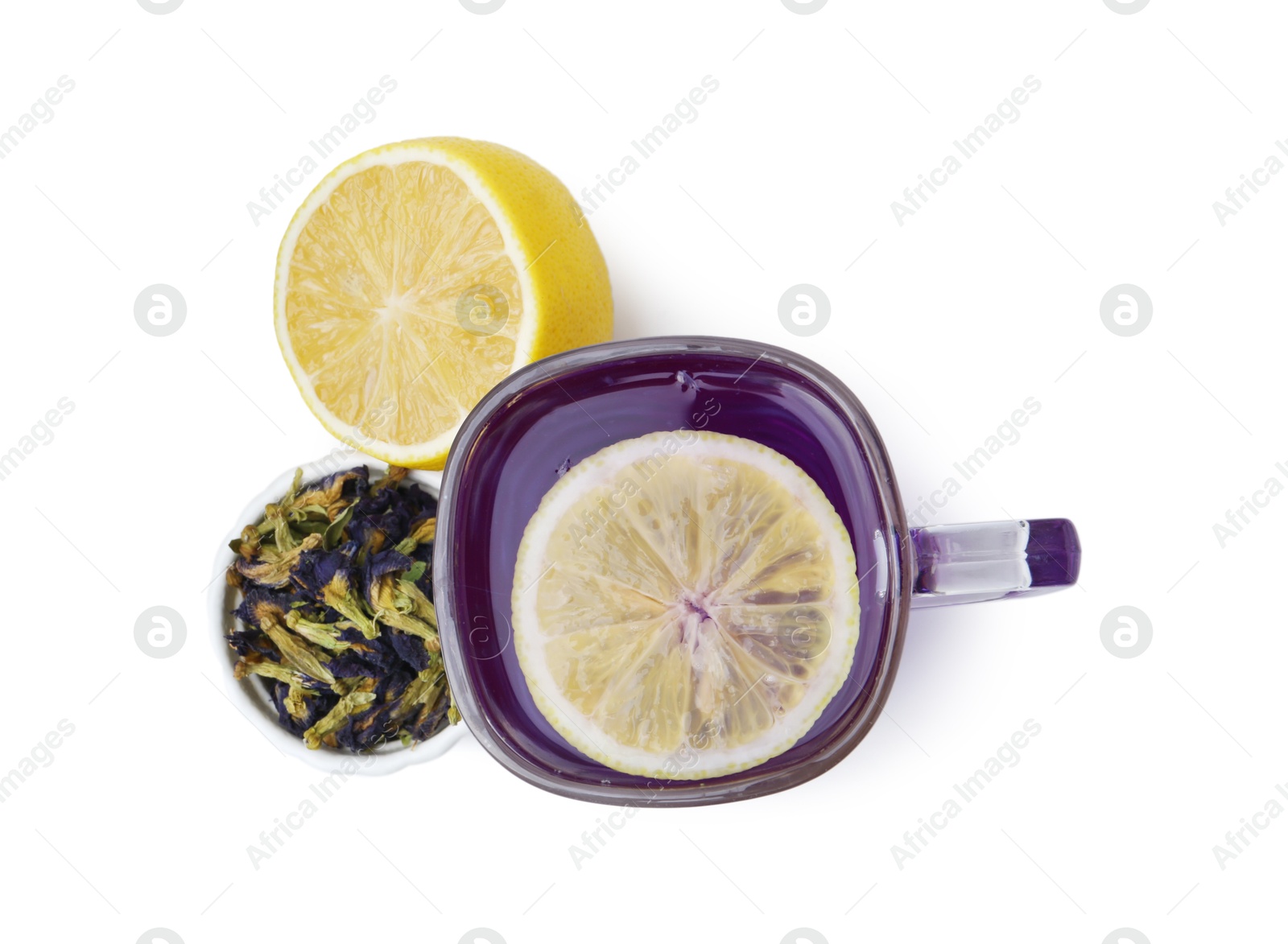 Delicious butterfly pea flower tea with lemon isolated on white, top view Photo of Delicious butterfly pea flower tea with lemon isolated on white, top view