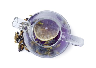 Photo of Delicious butterfly pea flower tea with lemon isolated on white, top view