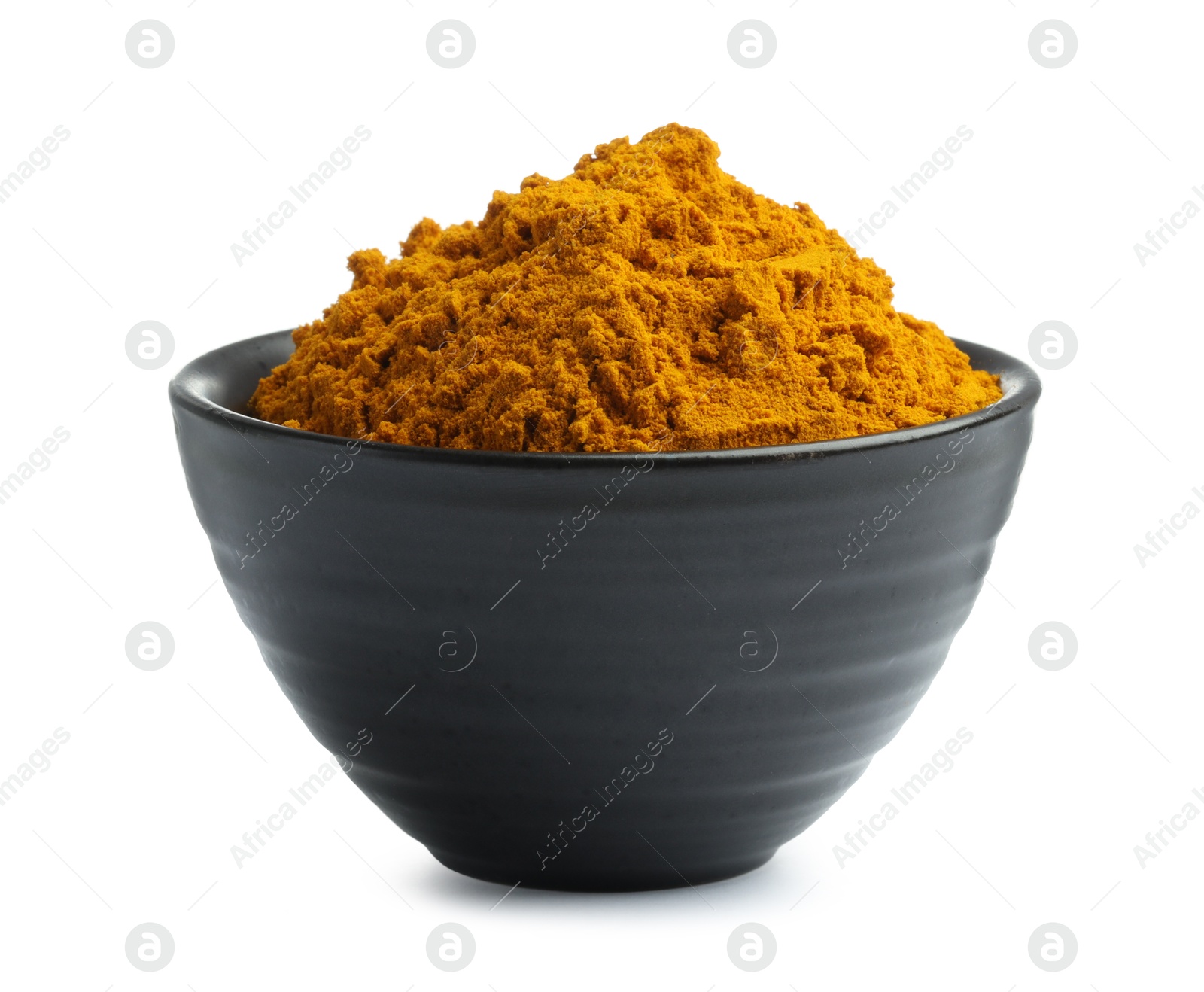 Photo of Turmeric powder in bowl isolated on white