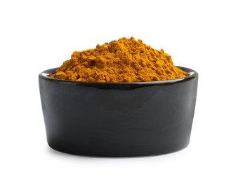 Photo of Turmeric powder in bowl isolated on white