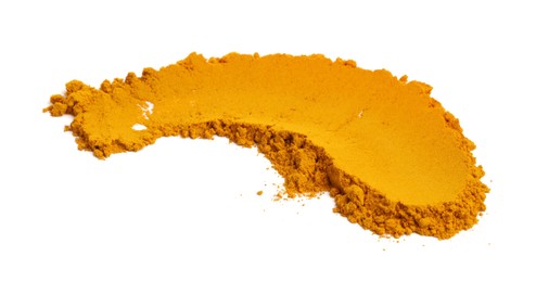 Photo of Heap of turmeric powder isolated on white