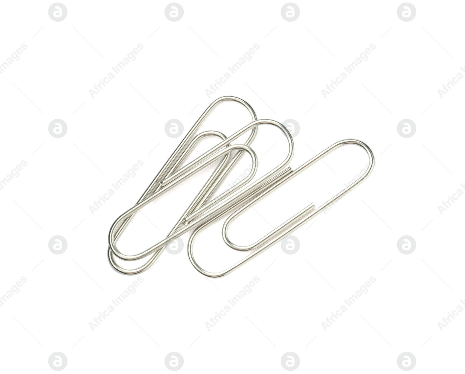 Photo of Metal paper clips isolated on white, top view