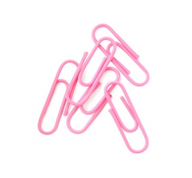 Photo of Pink paper clips isolated on white, top view