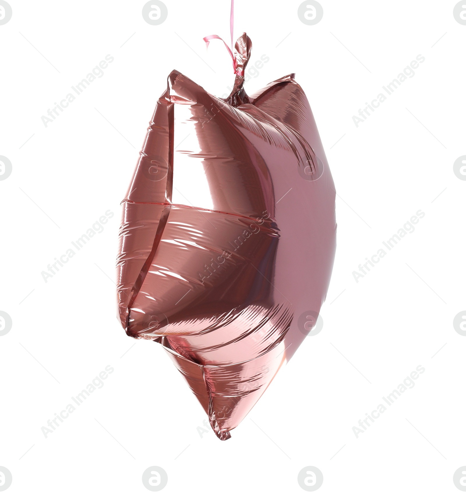 Photo of Pink shiny foil star shaped balloon isolated on white