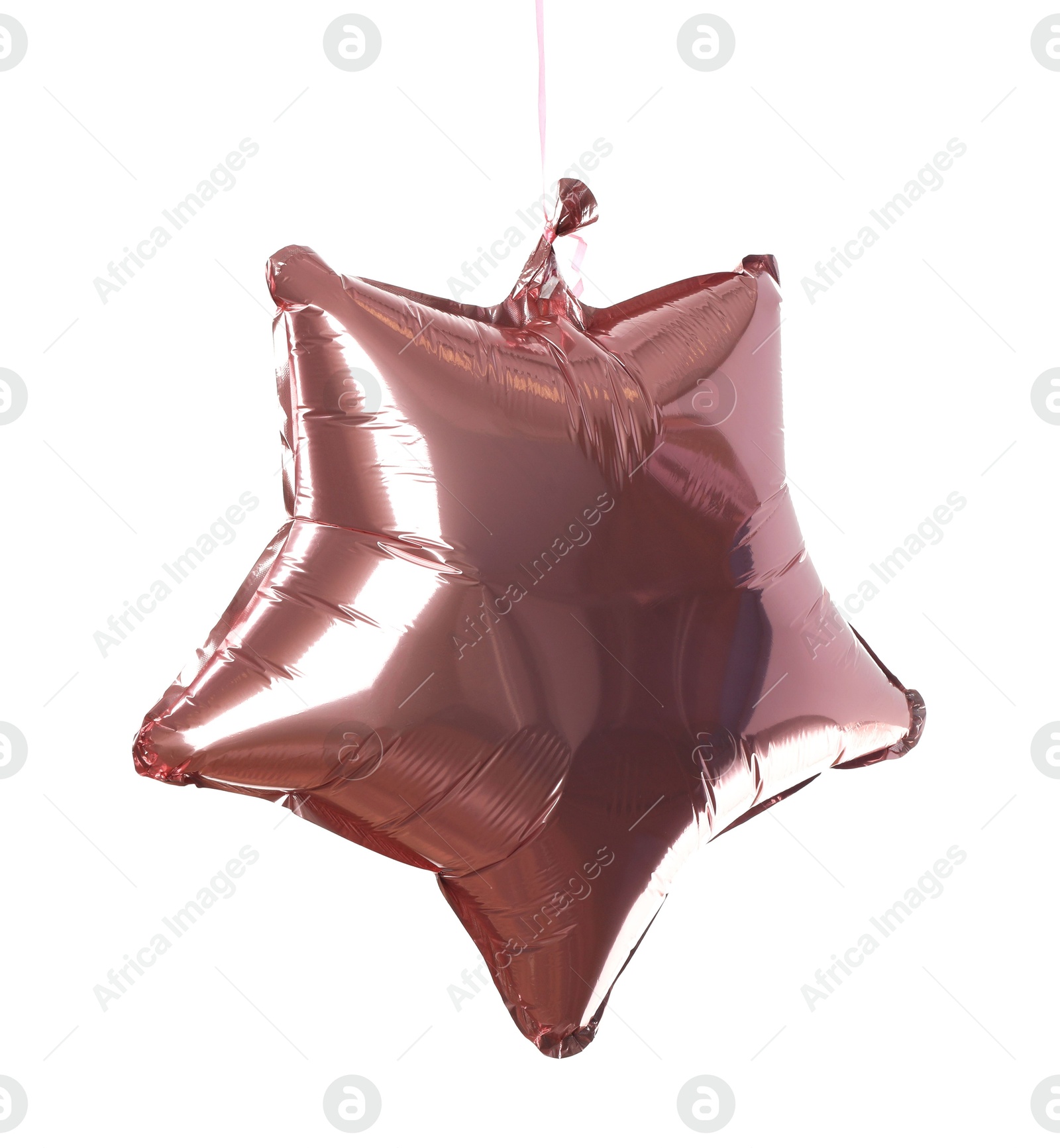 Photo of Pink shiny foil star shaped balloon isolated on white