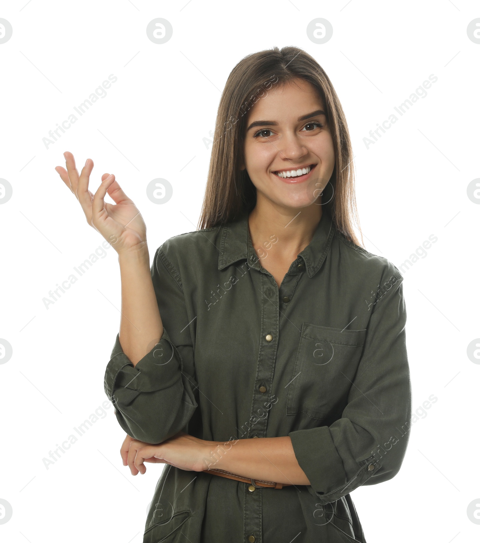 Photo of Young woman in casual clothes talking on white background