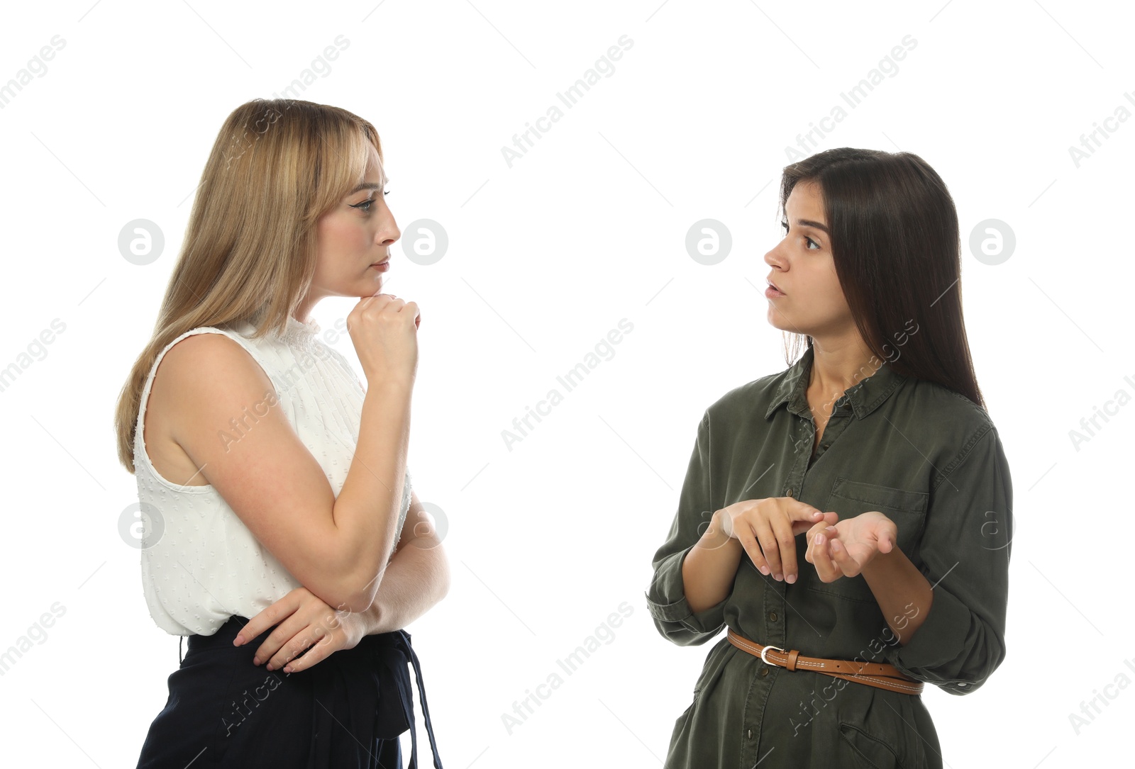 Photo of Young women in casual clothes talking on white background