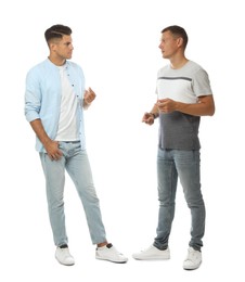 Photo of Men in casual clothes talking on white background