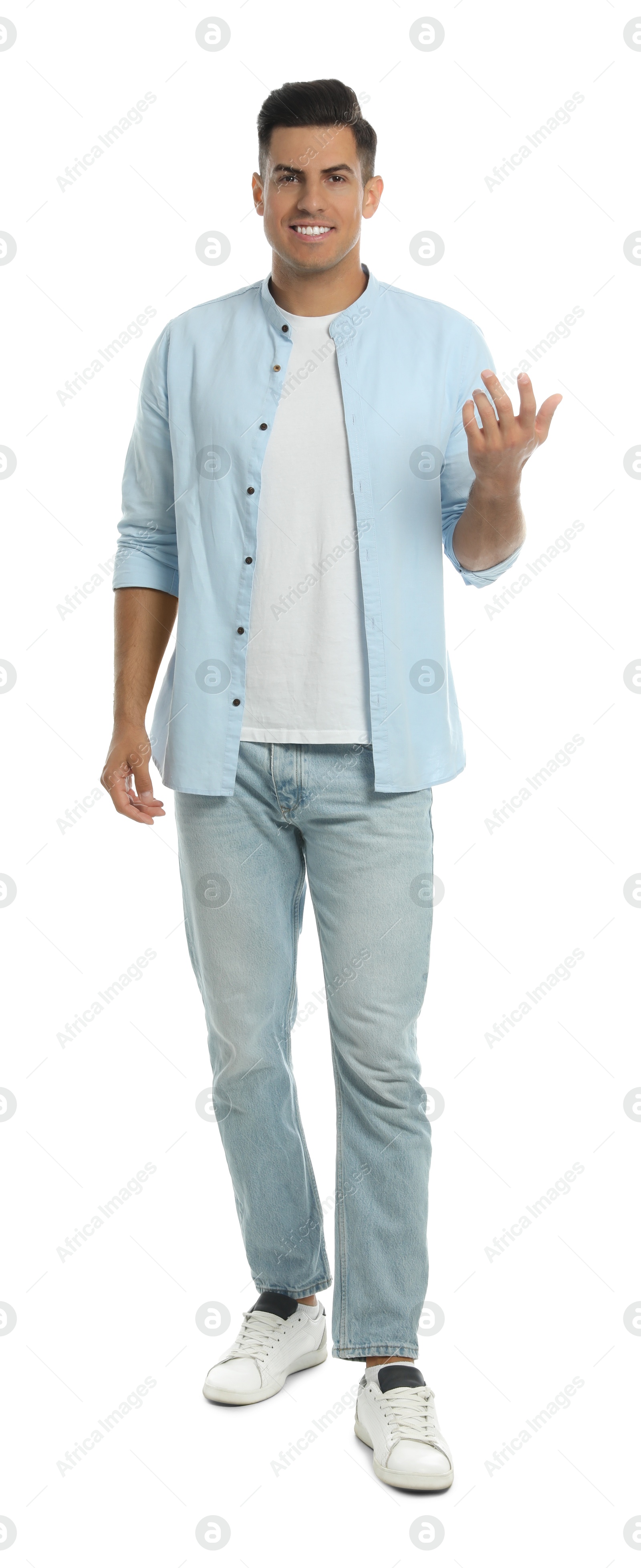 Photo of Man in casual clothes talking on white background