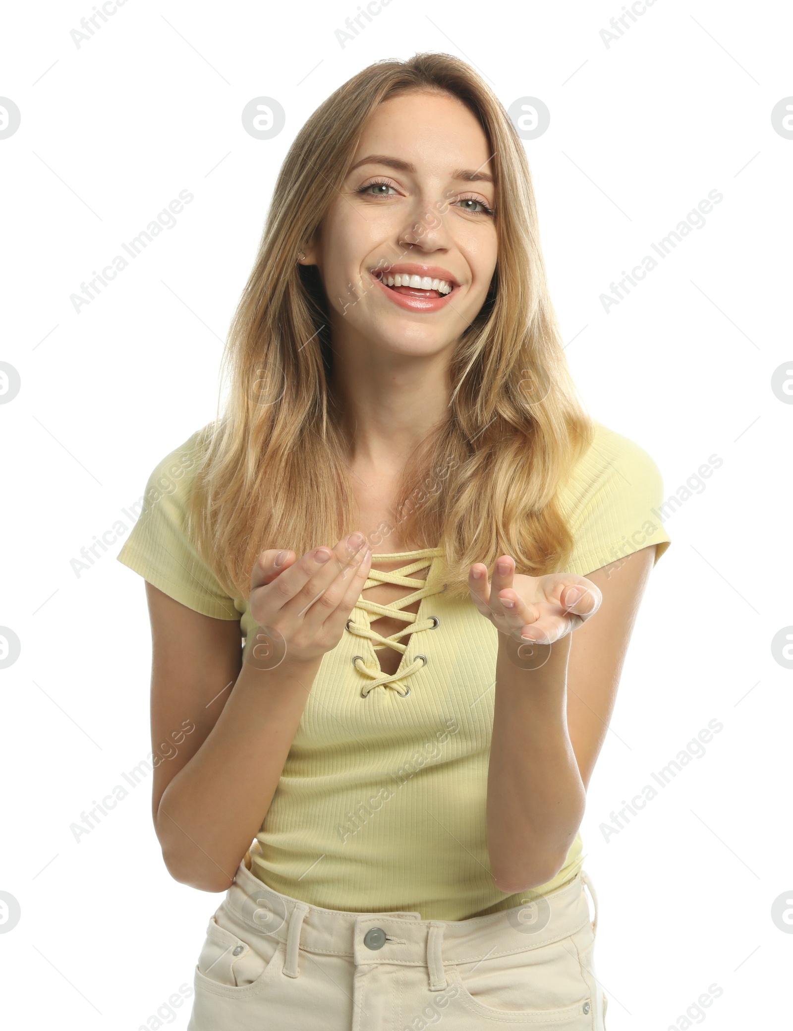 Photo of Young woman in casual clothes talking on white background