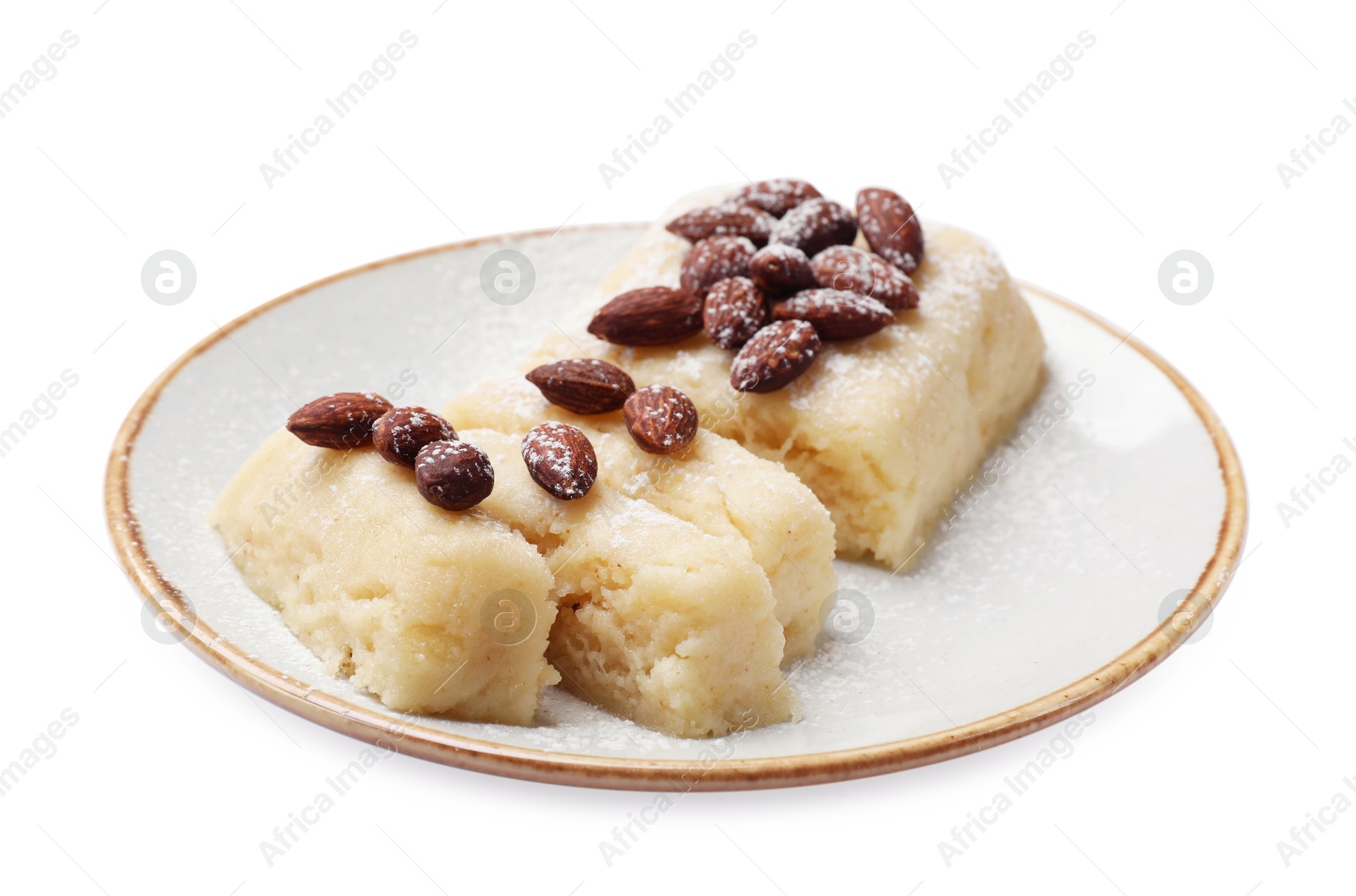 Photo of Delicious sweet semolina halva with almonds isolated on white