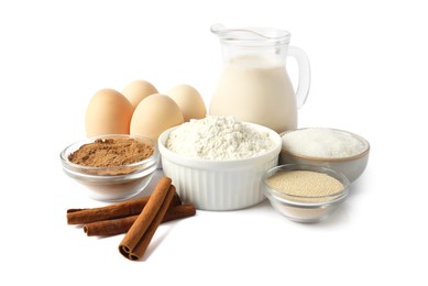 Photo of Making cinnamon rolls. Different ingredients for dough isolated on white