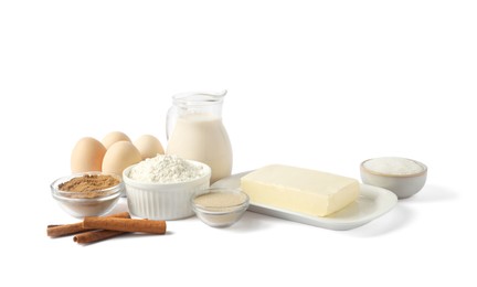 Photo of Making cinnamon rolls. Different ingredients for dough isolated on white