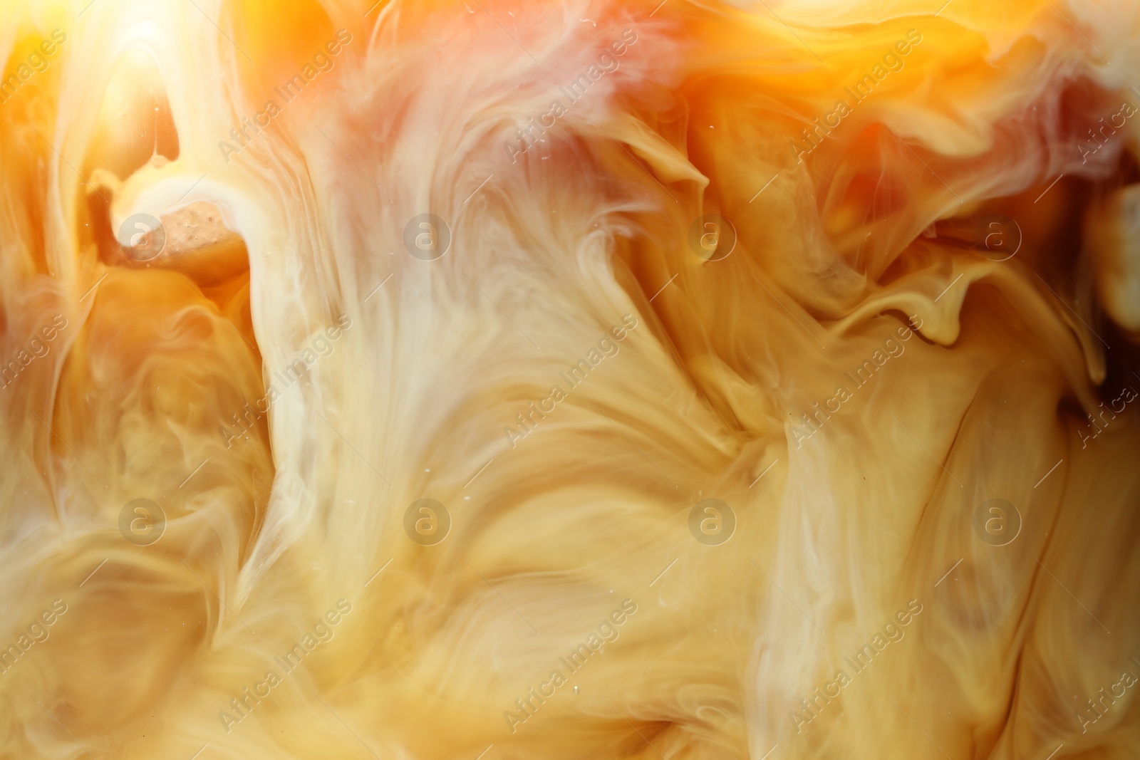 Photo of Refreshing coffee with ice and milk as background, closeup