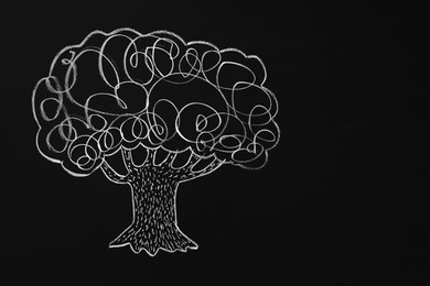 Photo of Beautiful drawing of tree on black chalkboard. Space for text