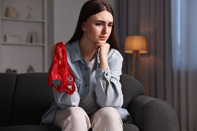 Photo of Frustrated wife with mistress panties alone at home