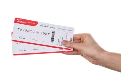 Photo of Travel agency. Woman holding flight tickets on white background, closeup